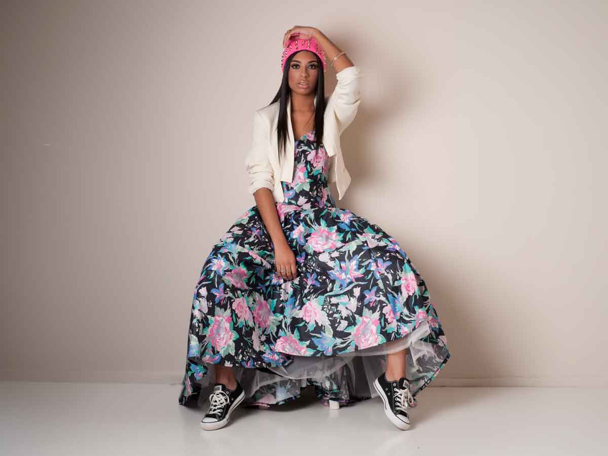 Creative portrait of a model wearing a flower dress